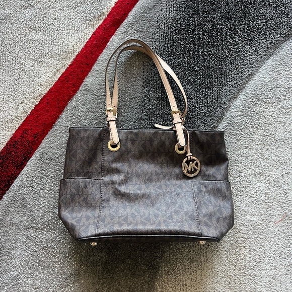 Michael Kors East West Jet Set Brown Monogram Tote - Picture 1 of 9